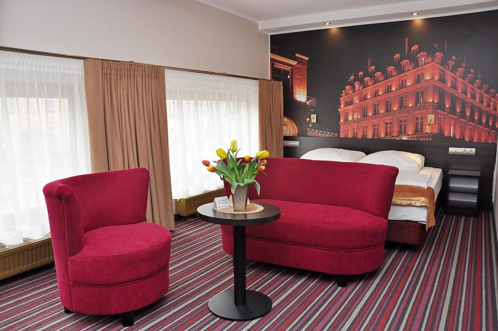 Hotel Atrium Nowy Tomyśl Rom bilde